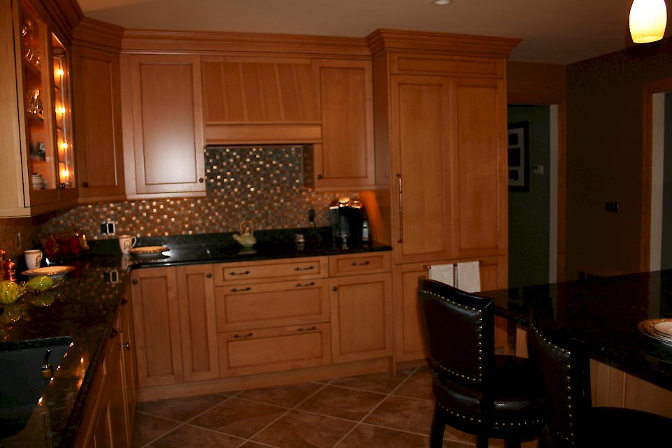 View of the custom hood and cooking area.