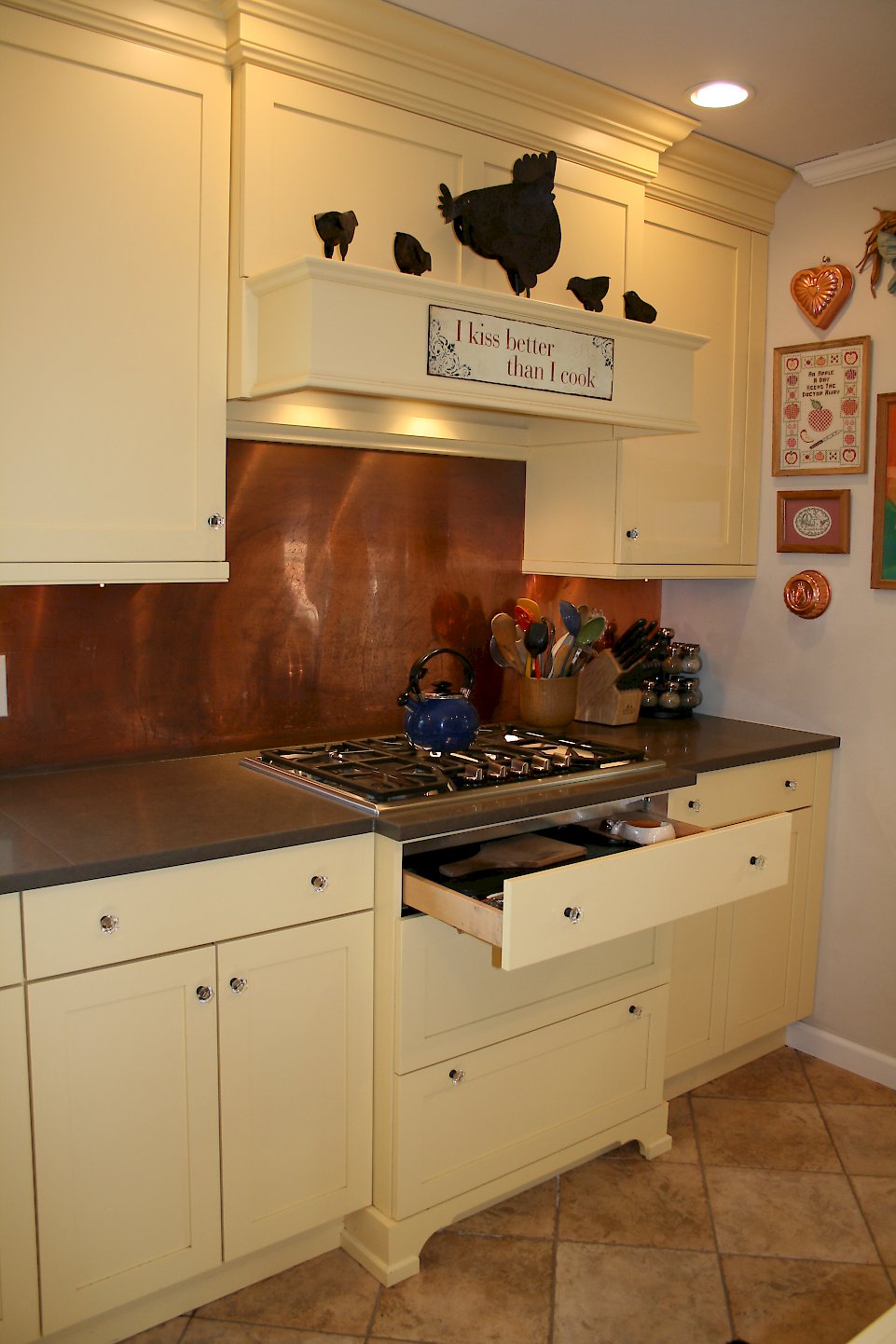 A Thermador 30" gas cooktop with a shallow drawer underneath.