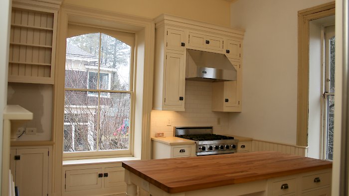 Sturbridge inset kitchen with vintage white finish.