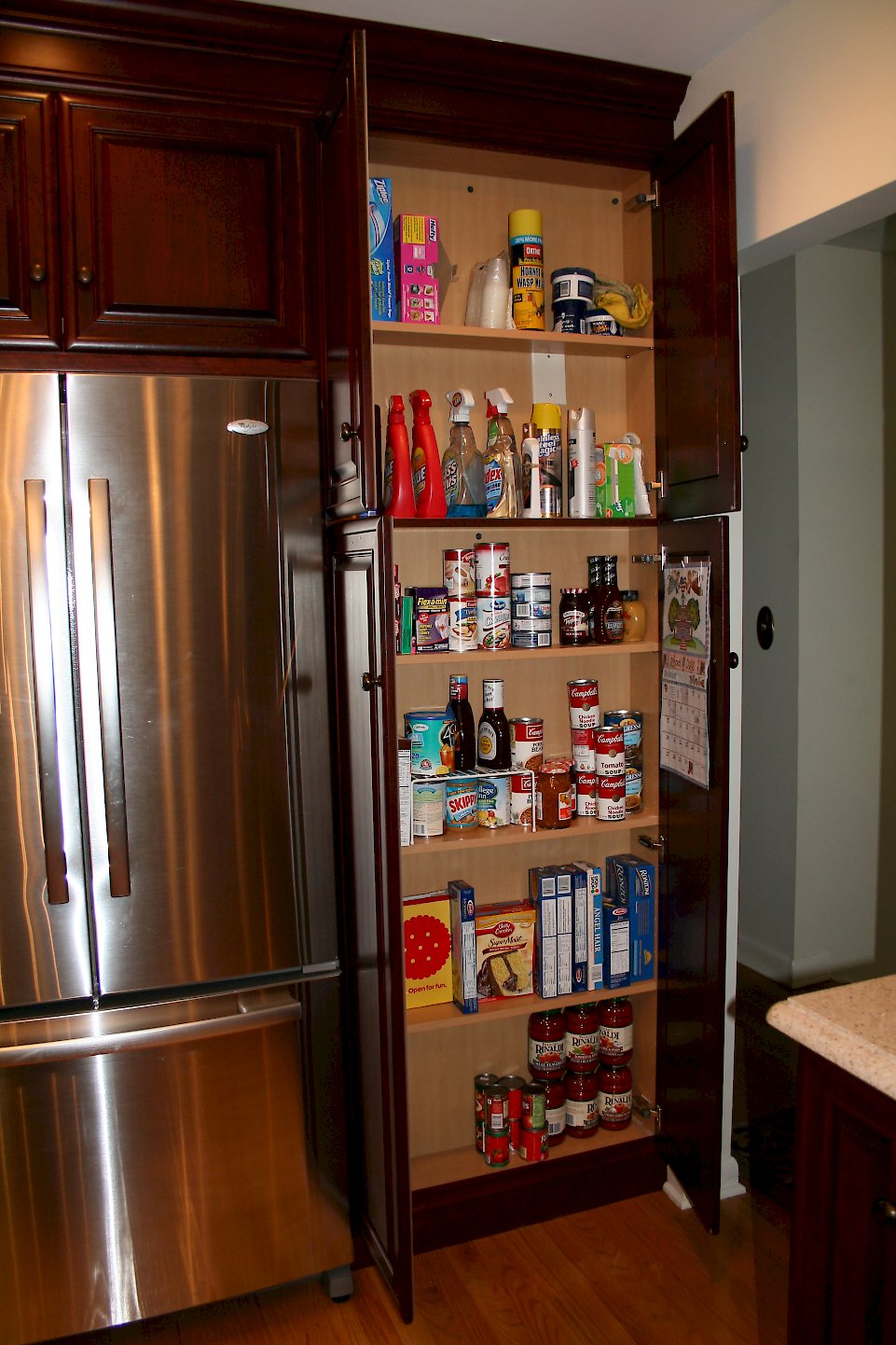 The tall pantry cabinet.