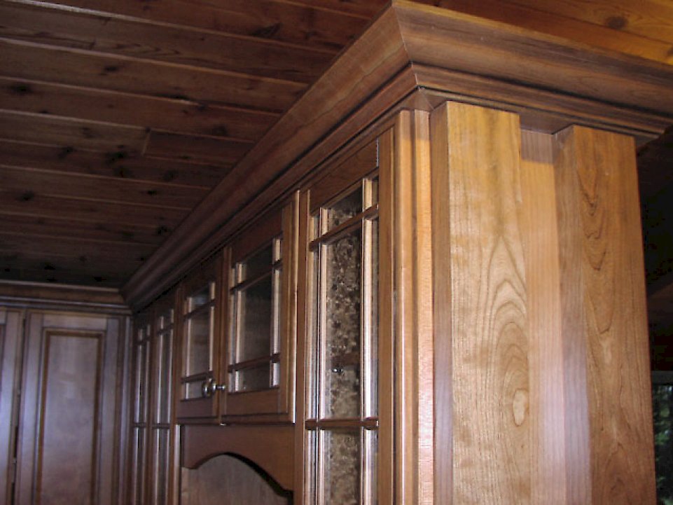View of the Crown molding on the glass cabinets.