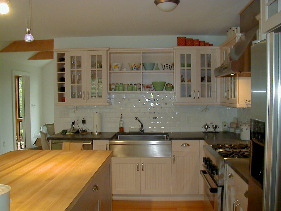 A beaded white Brookhaven Kitchen with Soapstone Counter-tops.