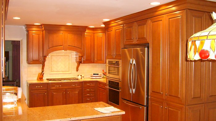 An autumn cherry kitchen with Wood-Mode Cabinetry.