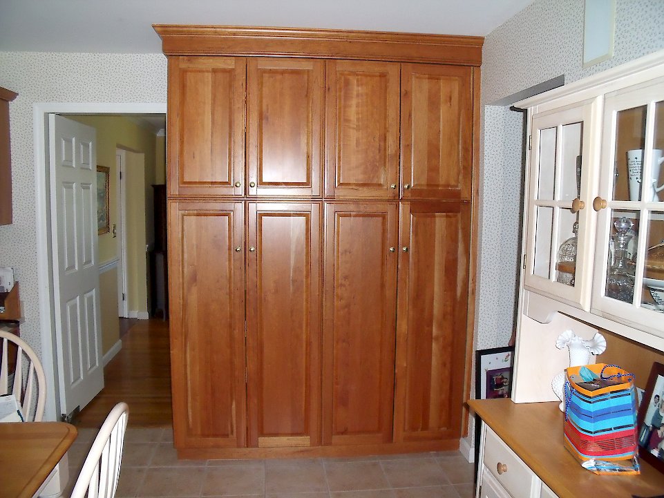 Tall cabinetry for food storage.