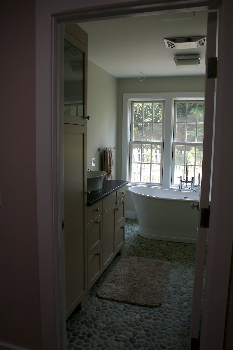 View of the bath cabinetry entering the room.